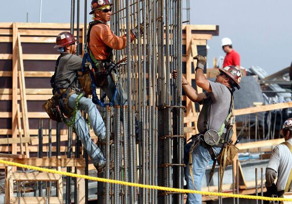 In this Jan. 19, 2011 photo, construction workers work on a  twelve and ten story apartment building project under construction in the Little Haiti area of Miami. A growing number of Americans either cant afford a home or dont want to own one, a trend thats spawning a generation of renters and a surge in apartment construction. (AP Photo/Alan Diaz)